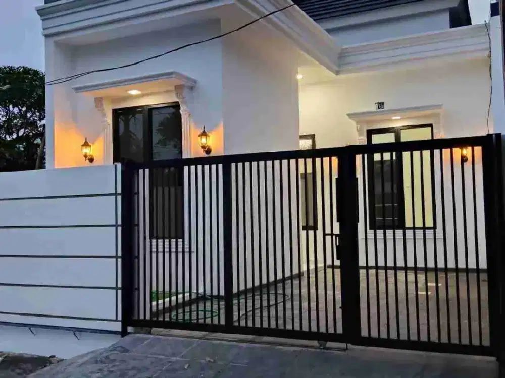 DIJUAL RUMAH MODERN KEKINIAN SIAP HUNI DI SAWOJAJAR 2 MALANG, DEKAT PASAR DAN EXIT TOL MALANG.
