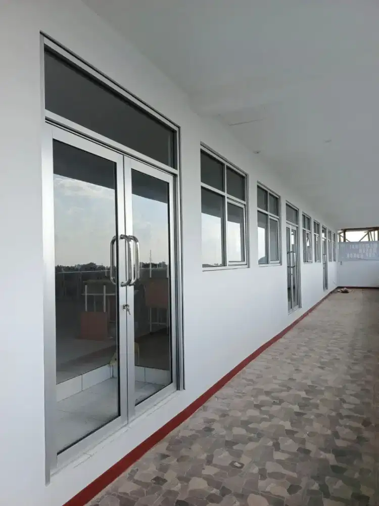 Tukang jendela, pintu kaca upvc aluminium,pintu sekat kaca kantor