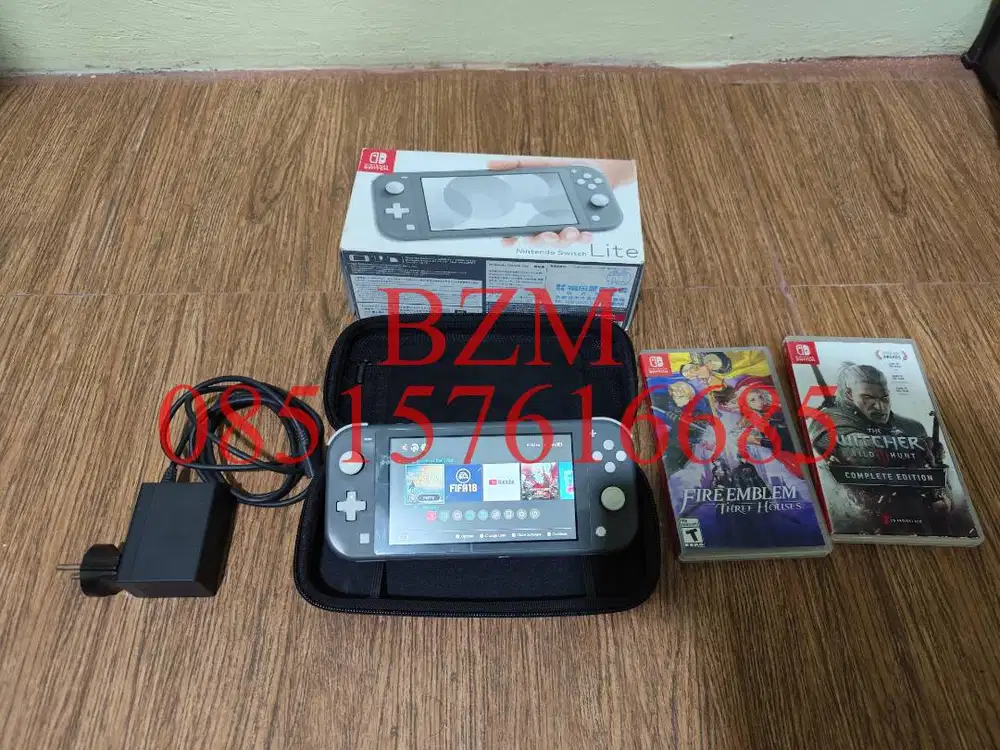 Nintendo Switch Lite (Gray) + 2 Catridge Game