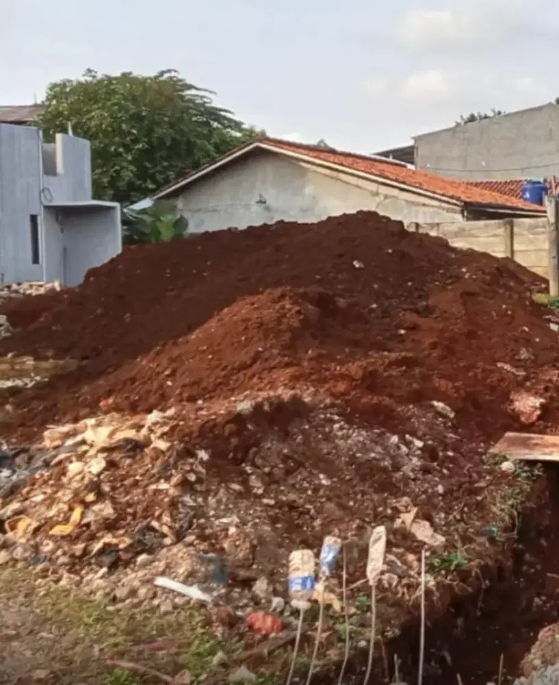 Jasa pengurugan tanah merah dan puing