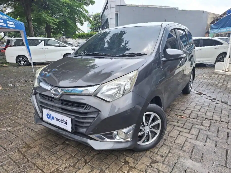Pajak Panjang TDP 6JT Daihatsu Sigra 1.2 R Bensin-MT 2019 Abu-Abu