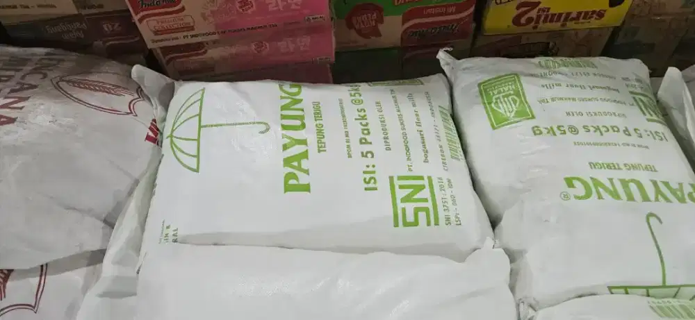 PACKER produksi