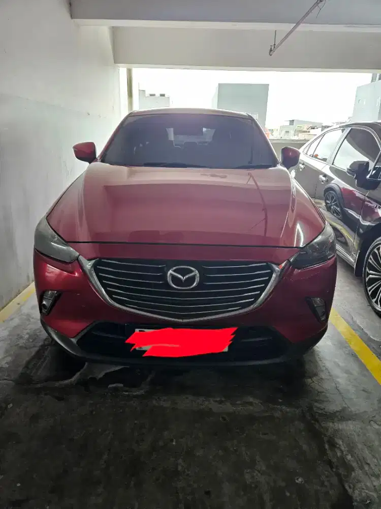 Mazda cx3 touring warna merah tahun 2017