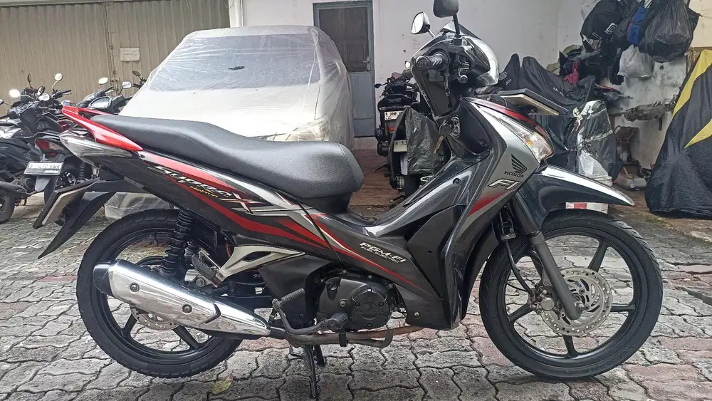 Honda Supra X 125 helm in tahun 2013.