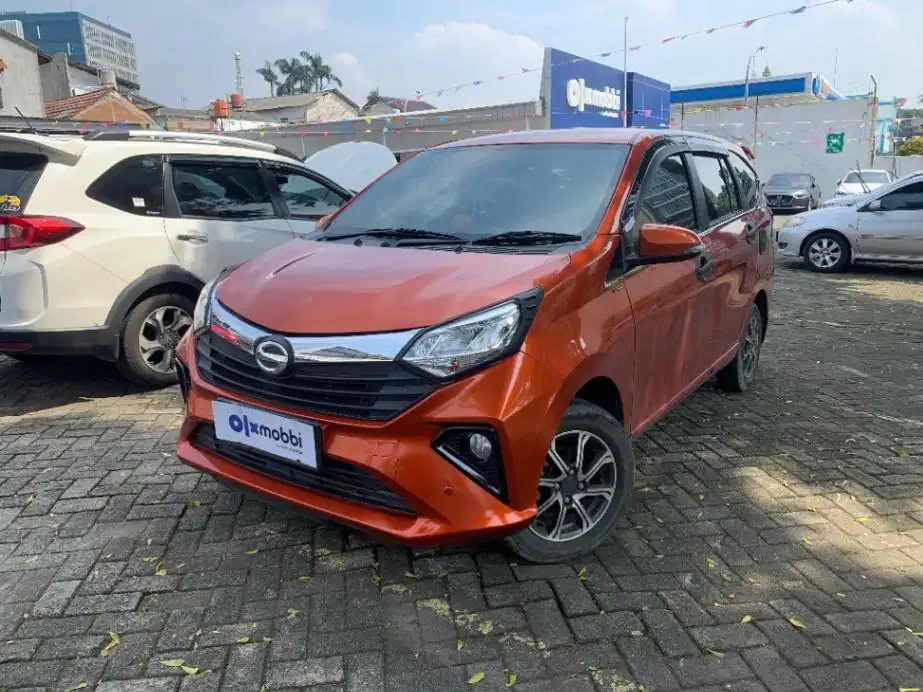 DP MURAH Daihatsu Sigra 1.2 R Deluxe Bensin-MT 2021 Orange C6EDA