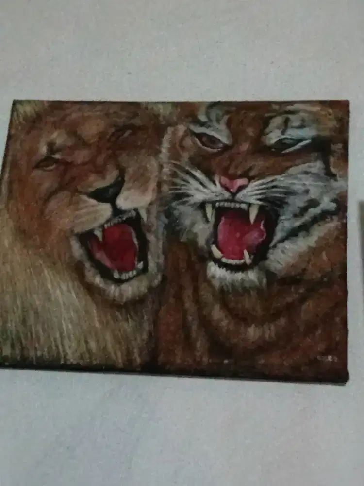 Lukisan duet singa macan