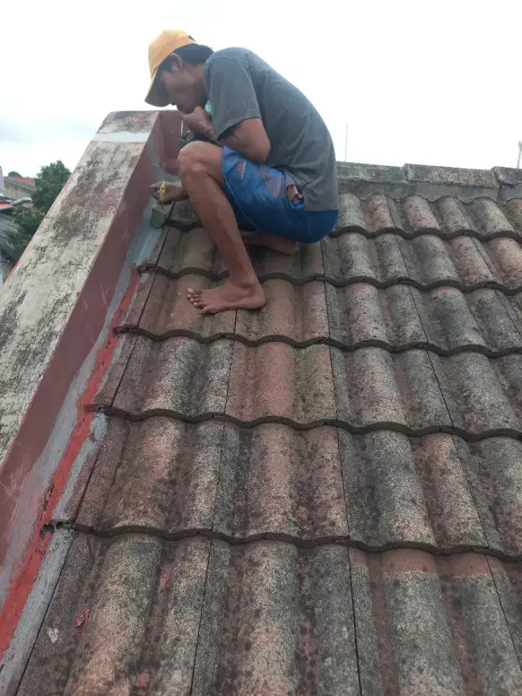 Tukang perbaikan atap bocor,dag,talang,kanopi,renopasi dll