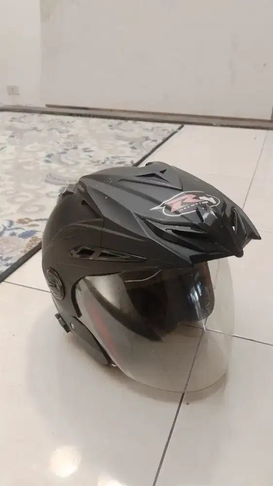 helm RN warna hitam kondisi bekas siap pakai