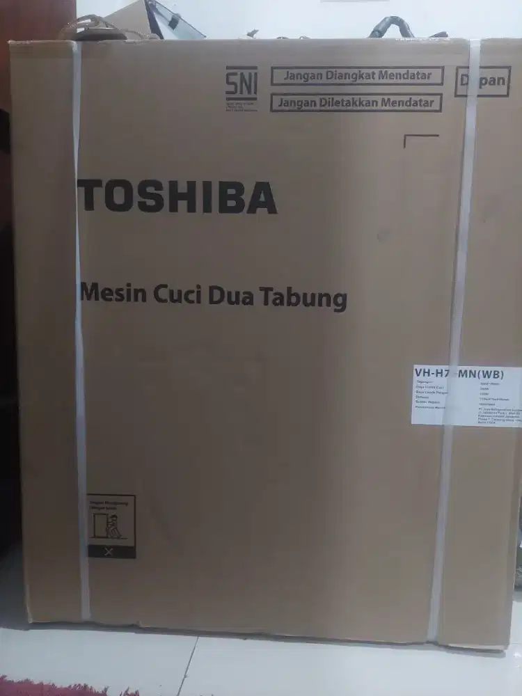 Mesin cuci baru masih segelan