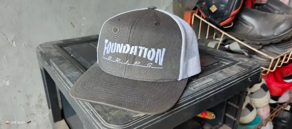 Foundation grips trucker by yupoong