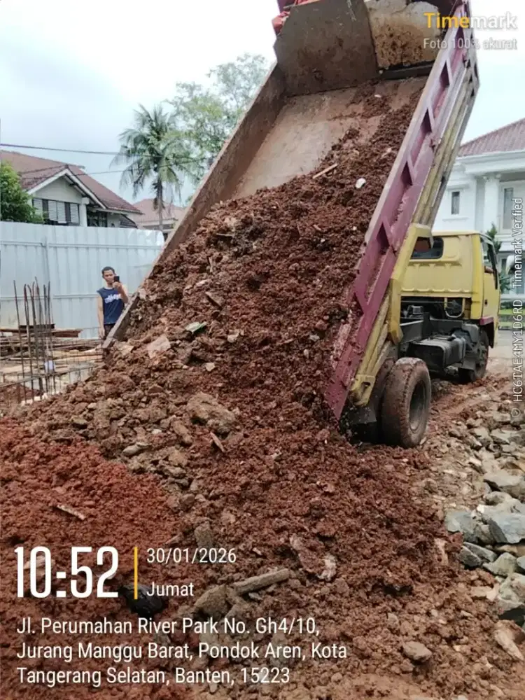 Jasa pengurugan dan buang tanah puing