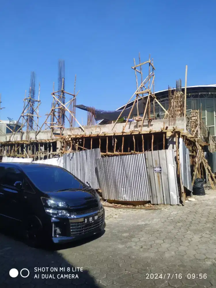 Tukang bangunan harian/borongan