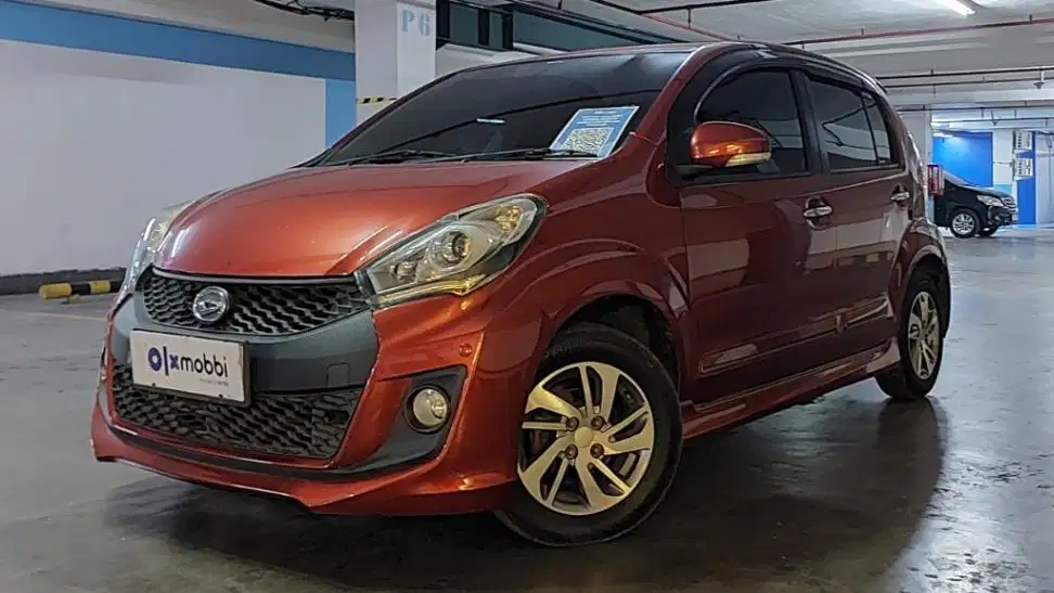TERMURAH TDP 5,JT Daihatsu Sirion 1.3 D Bensin-AT Orange 2015