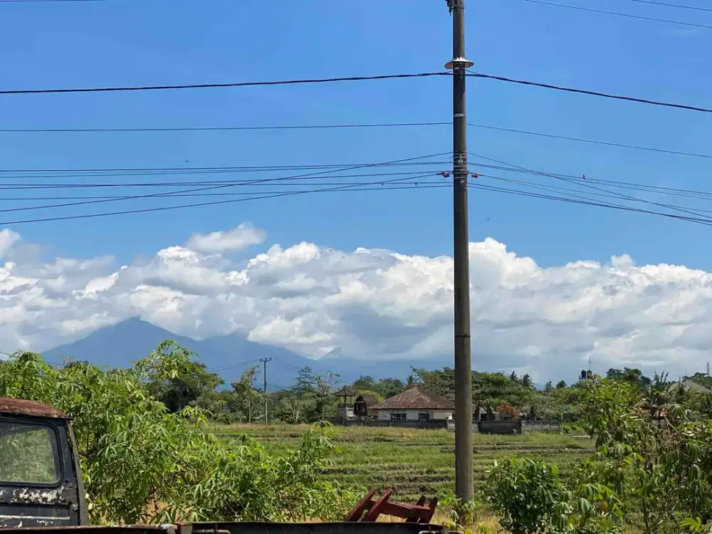 DI JUAL TANAH DEKAT PANTAI DENGAN VIEW GUNUNG, LAUT DAN DI KELILINGIN SAWAH