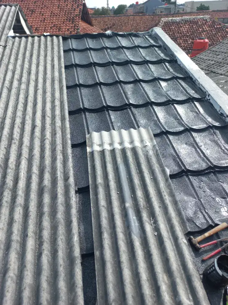 Tukang perbaikan atap bocor,dag,talang,kanopi,renopasi dll