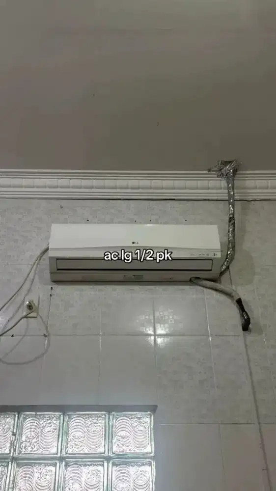 AC LG 1/2 pk kondisi bagus