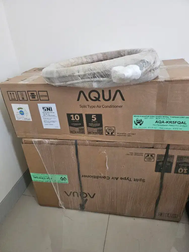 AC Aqua 1/2 pk bekas seperti baru