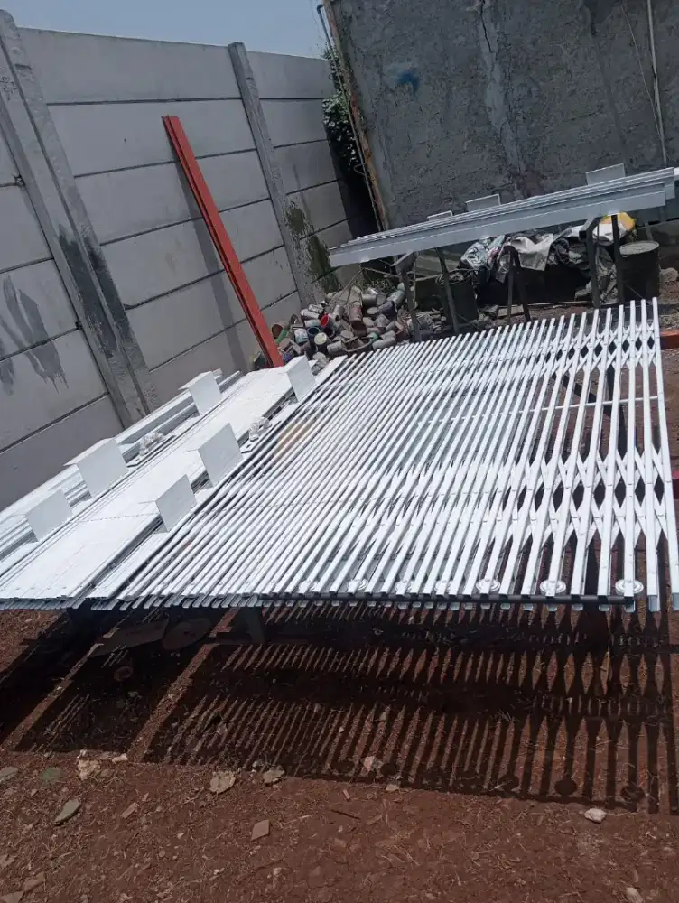 Folding gate rolling door