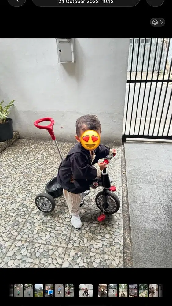 Sepeda roda tiga anak