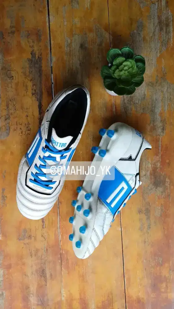 sepatu bola bekas capitten