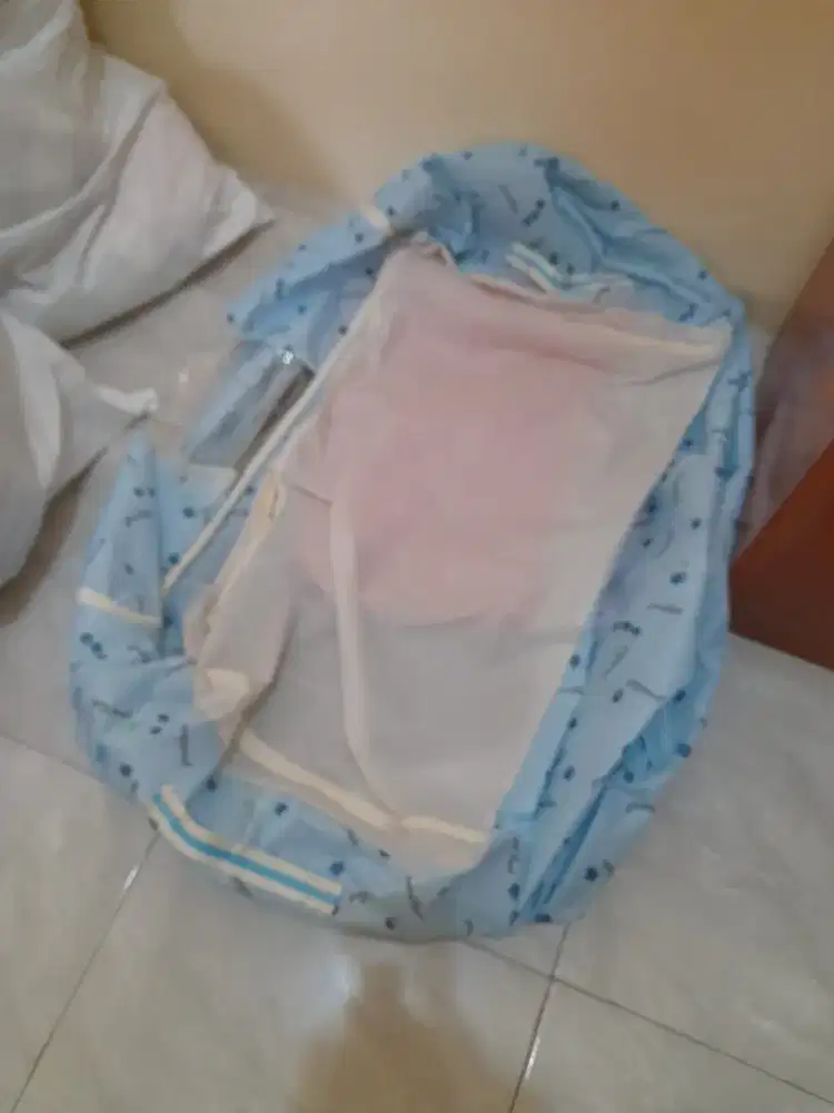 Penyimpanan pakaian atau keranjang lipat baju