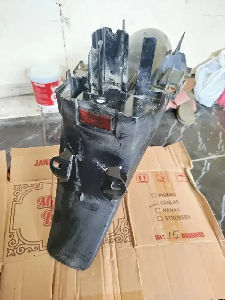 Spakbor belakang Supra X 125