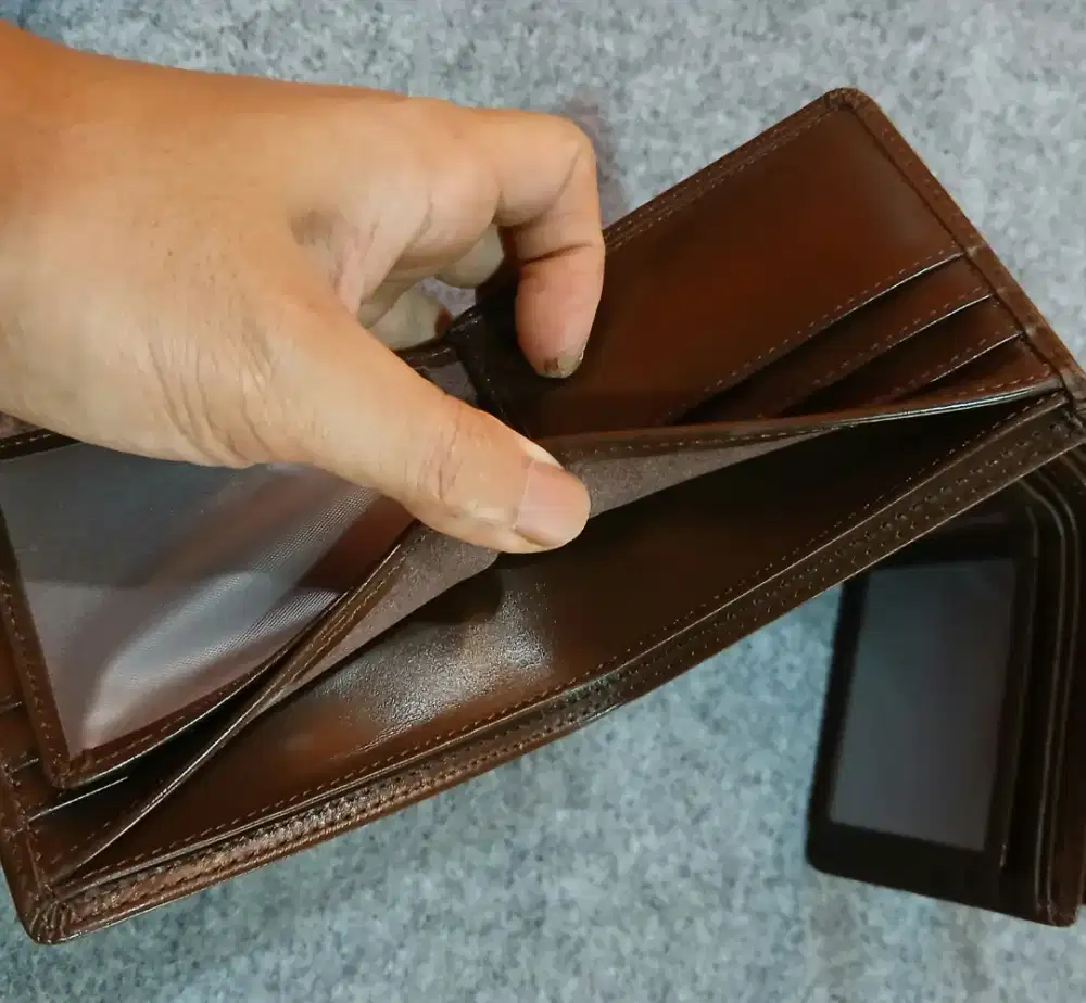 Dompet pria kulit sapi asli warna coklat di kirim dari Sleman