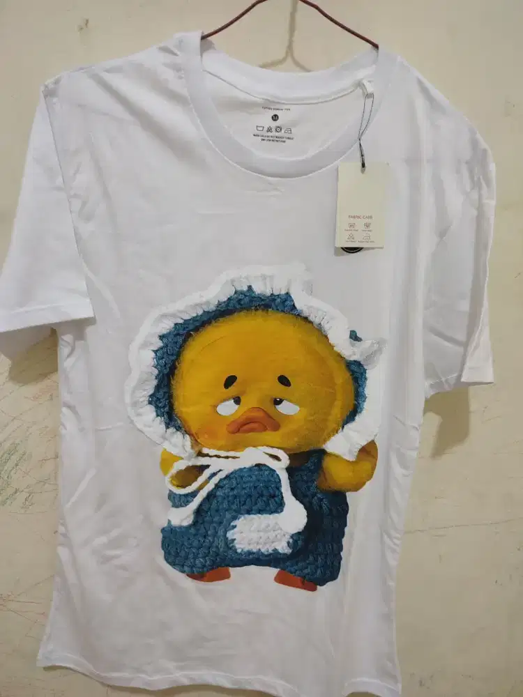 Kaos karakter oversize