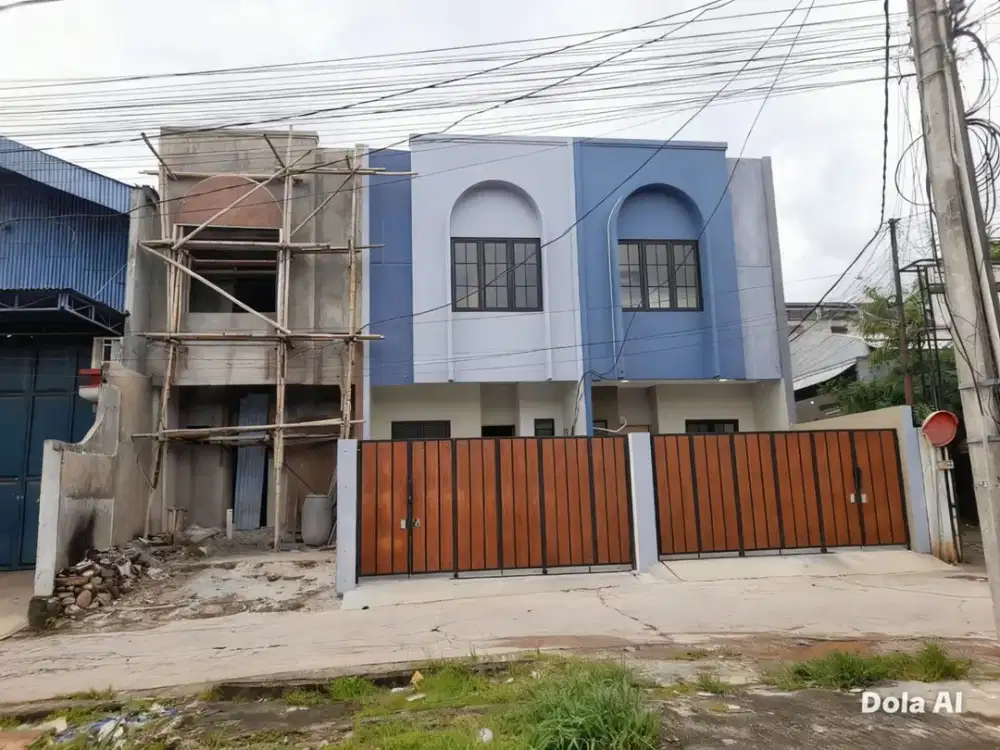 Rumah baru berkonsep modern pinggir jalan ,5menit ke LRT Cikunir 1 Caman