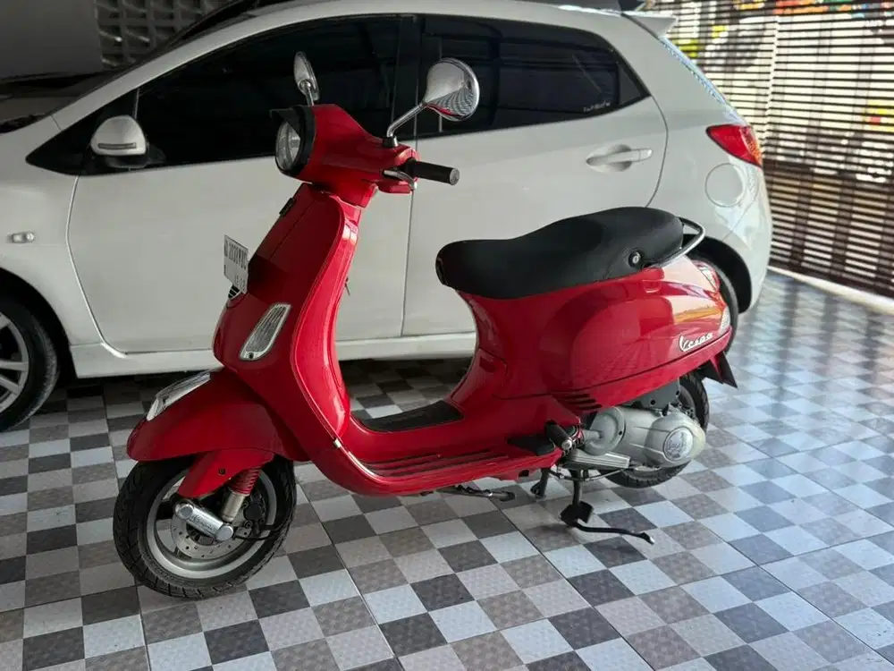 Vespa lx 150 2013 plat ad injeksi