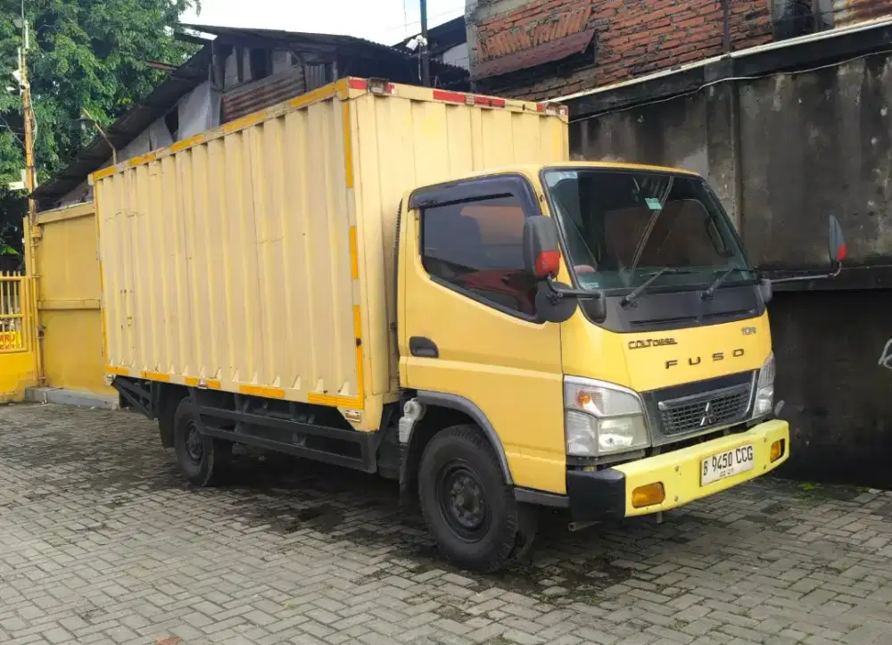 CDE Long Mitsubishi Coltdiesel canter FE 71 L engkel box besi 2019 bok