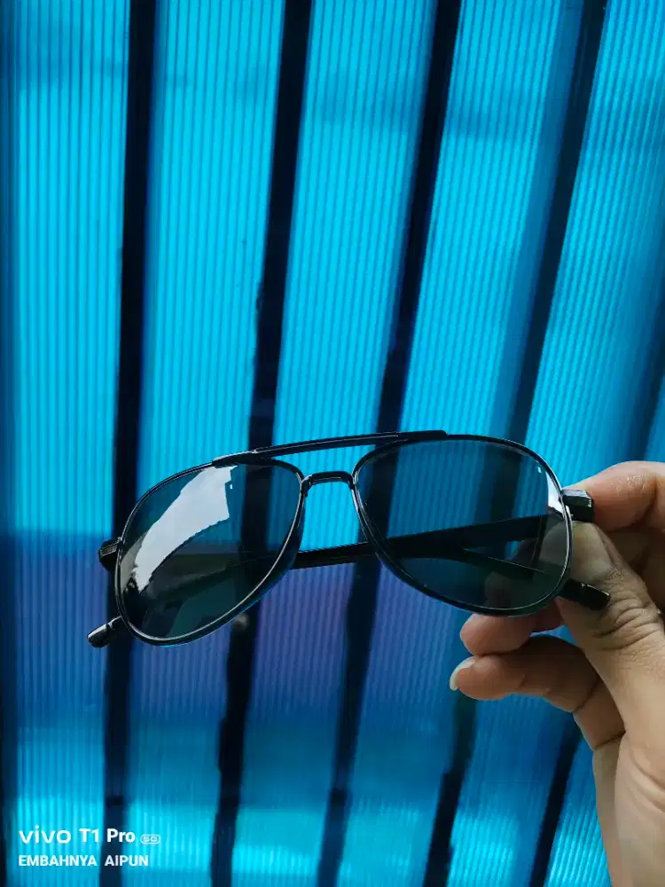 Kacamata elegant maskulin