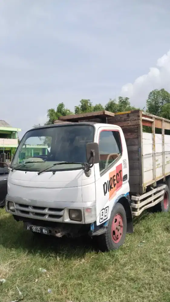 Truk Dyna 115 Bak Kayu