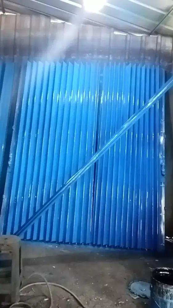 Rolling door folding gate