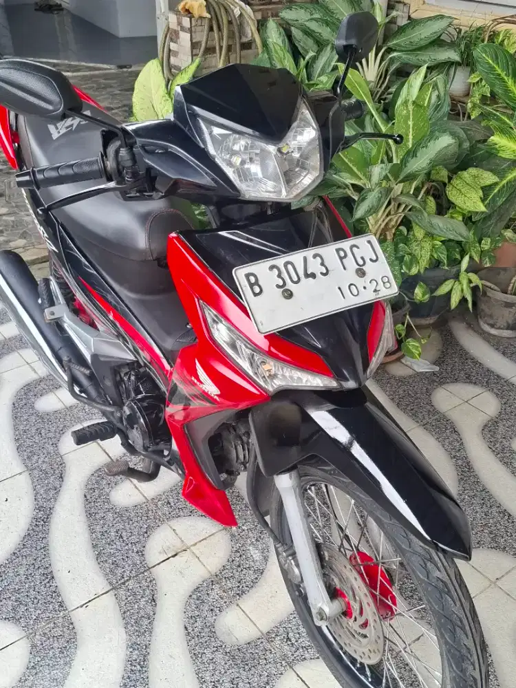 Honda Supra x 125 Merah Hitam