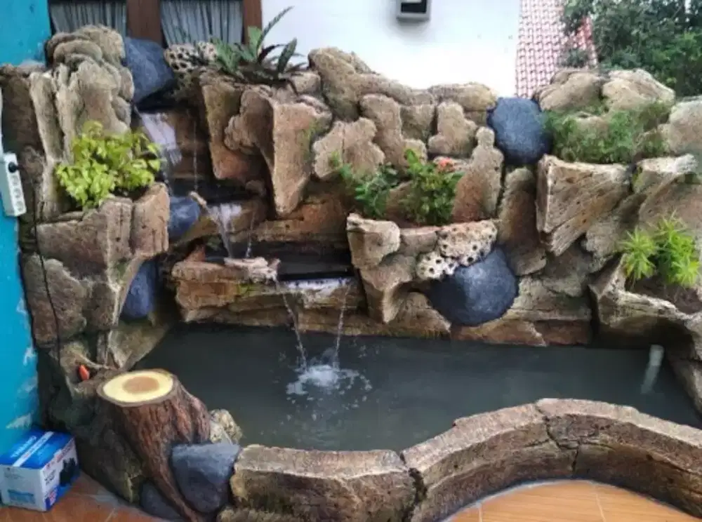 Pembuatan kolam koi relief tebing