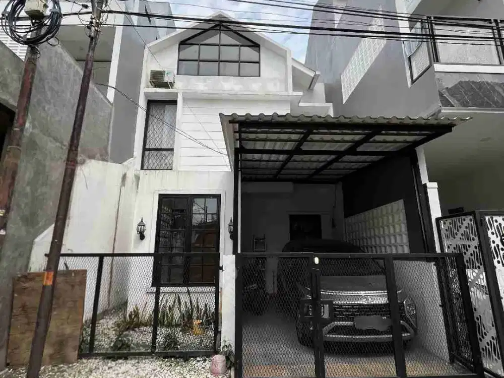 Rumah siap huni lantai 2 dengan menzzanin di kawasan Nusaloka yang asri
