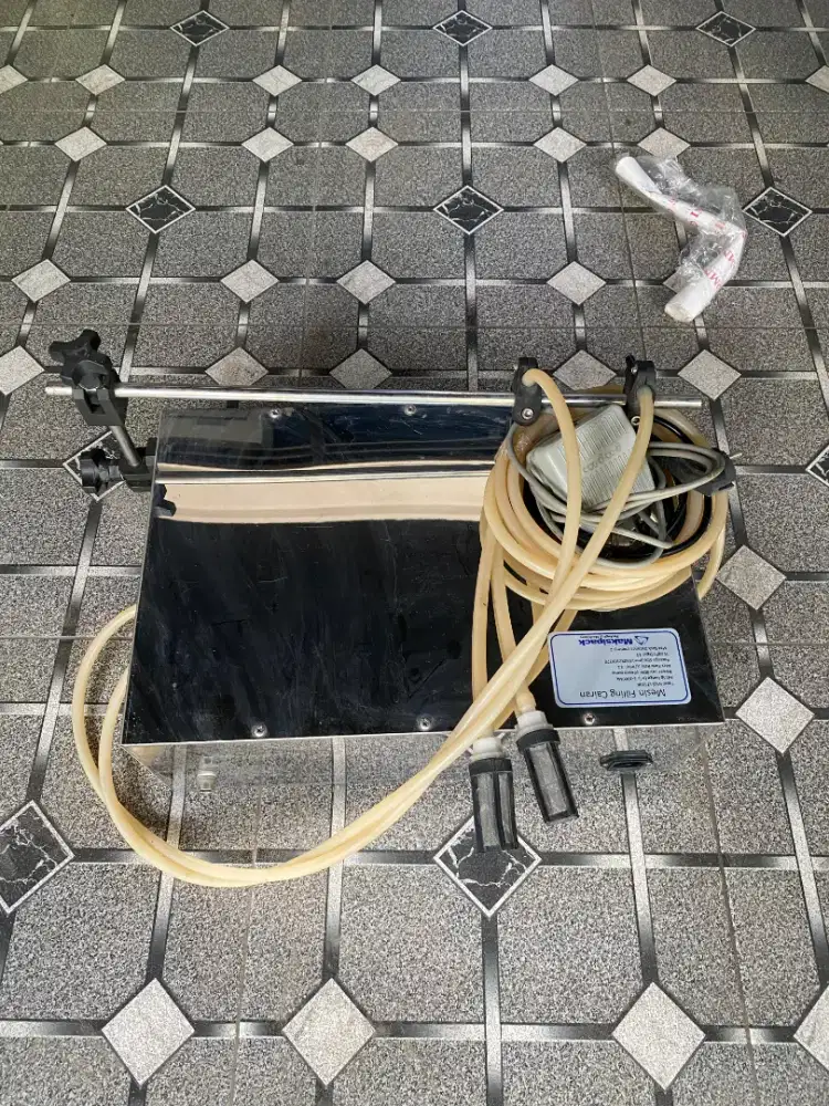 Mesin liquid filling mks lt 130II