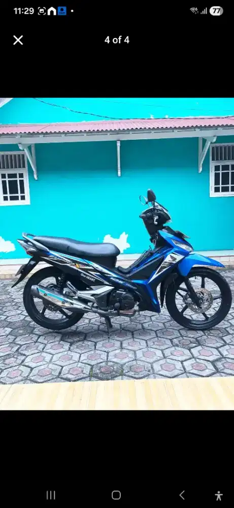 Supra x 125 2015 biru