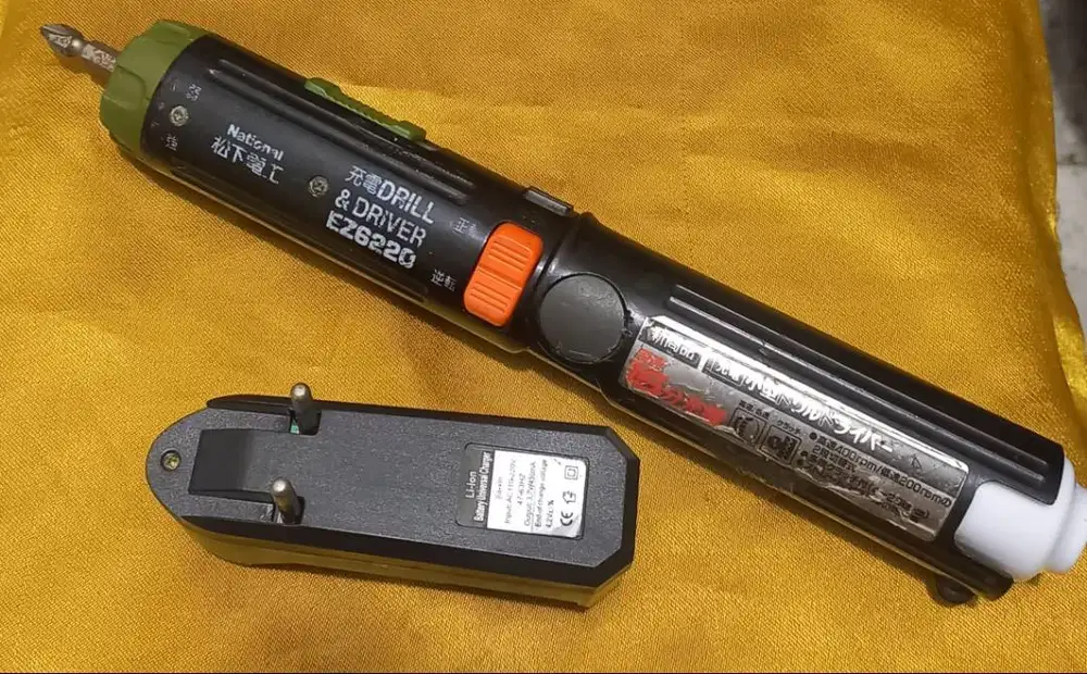 Obeng DC merk National,Obeng(+) dan Charger nya,Fungsi Normal,NET