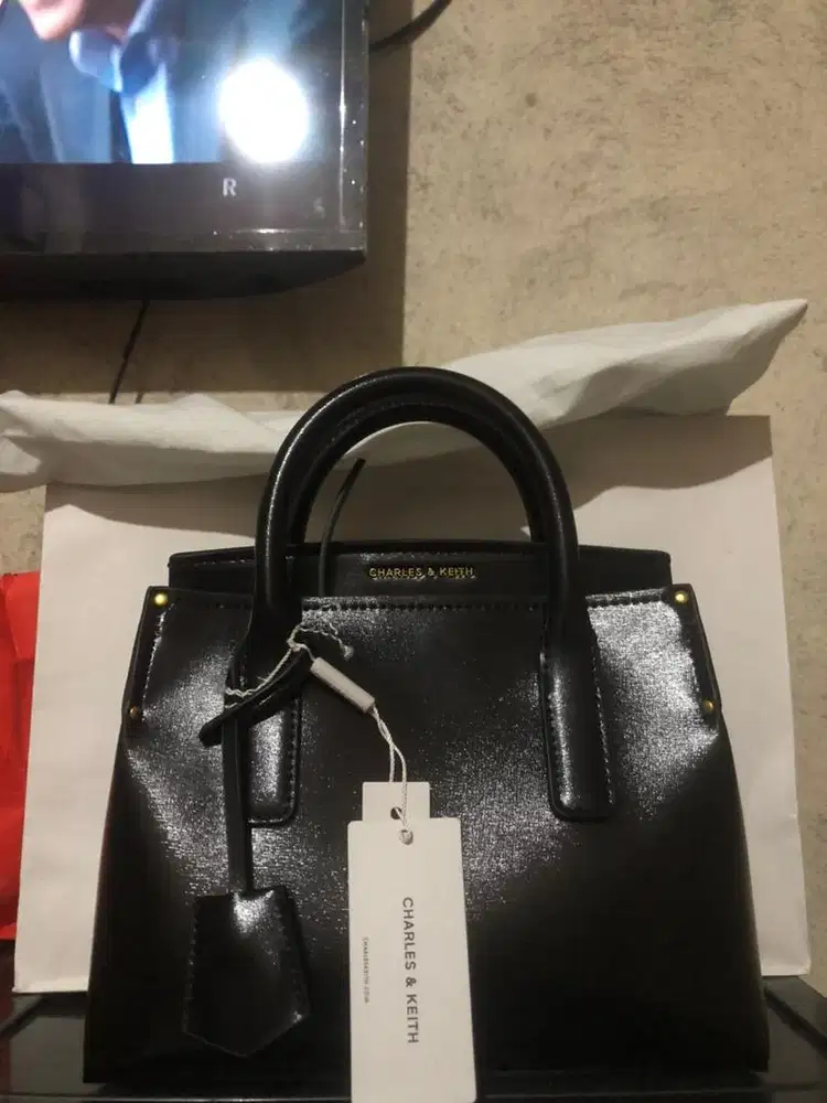 this is a charles&keith rene structured top handle bag in black sz s