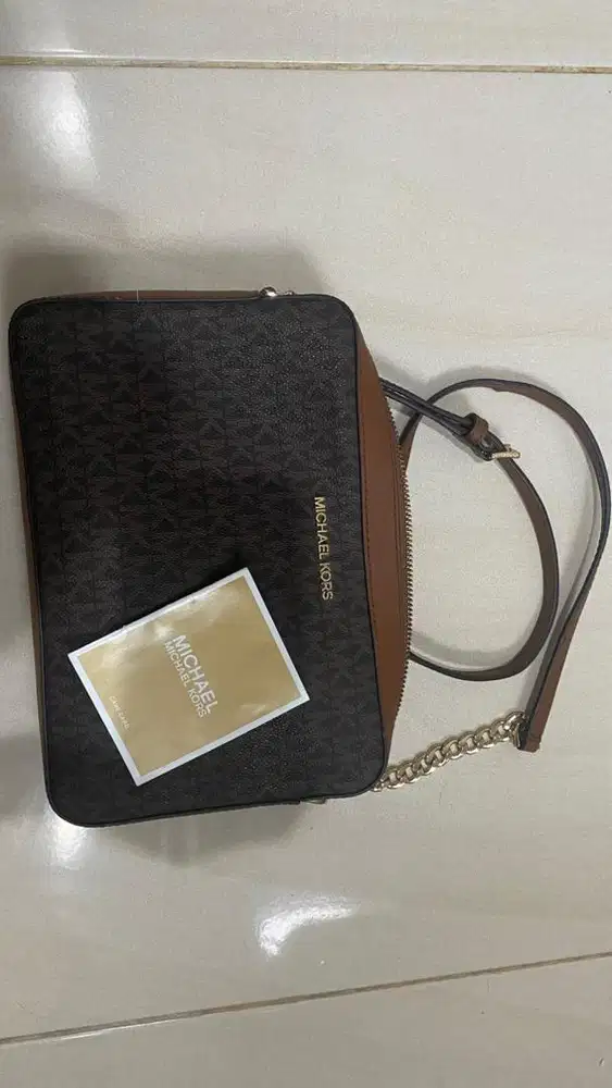 MK monogram sling bag