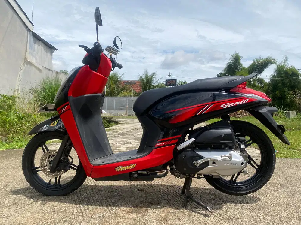 58@:DP:1,300RB B DEPOK GENIO CBS MERAH HITAM