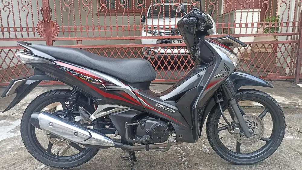 Honda Supra X 125 helm in tahun 2013.