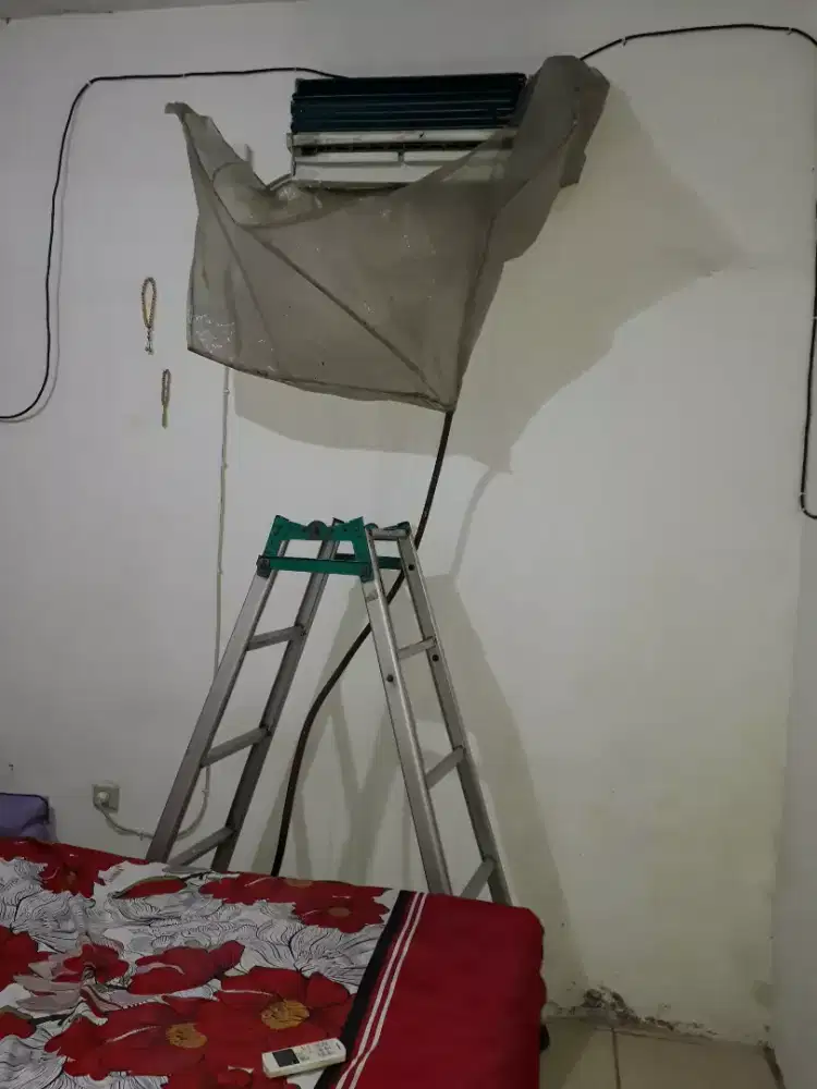 SERVICE AC DAN BONGKAR PASANG AC