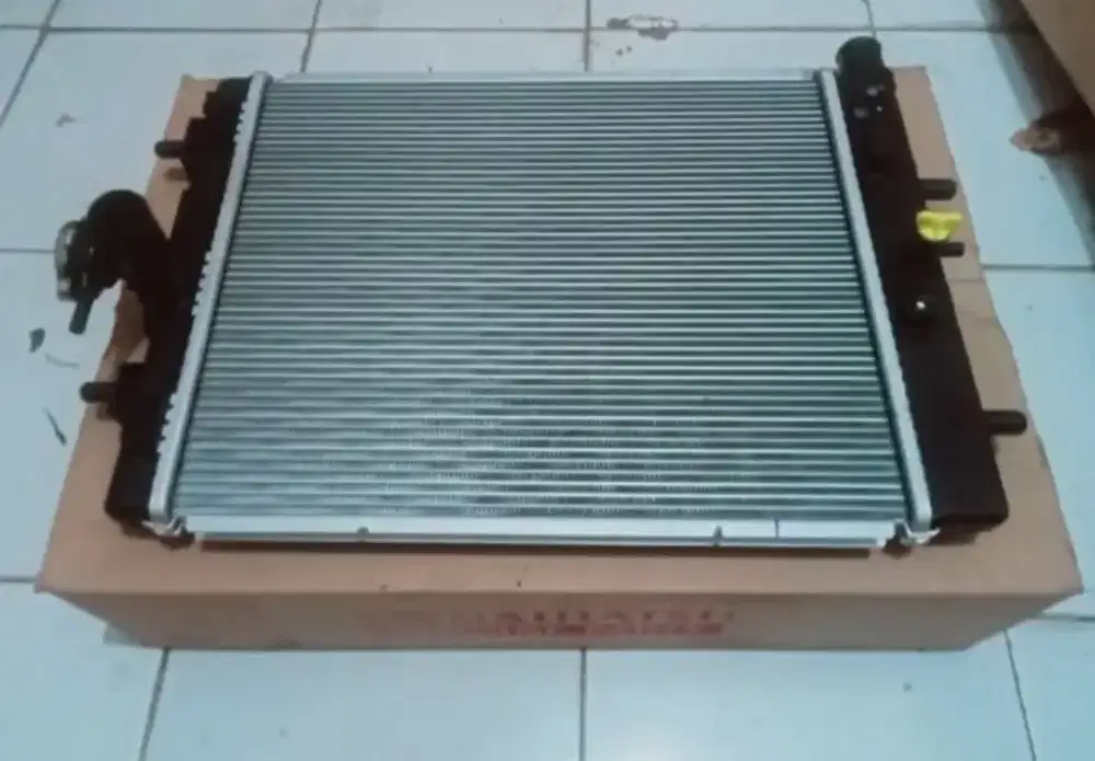 Radiator sigra asli/biasa