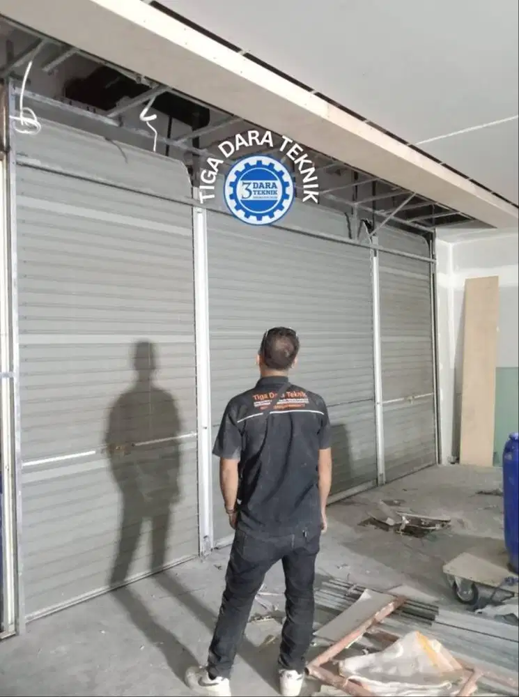 Spesialis pasang Rolling Door PT tiga dara teknik Amanah & Terpercaya