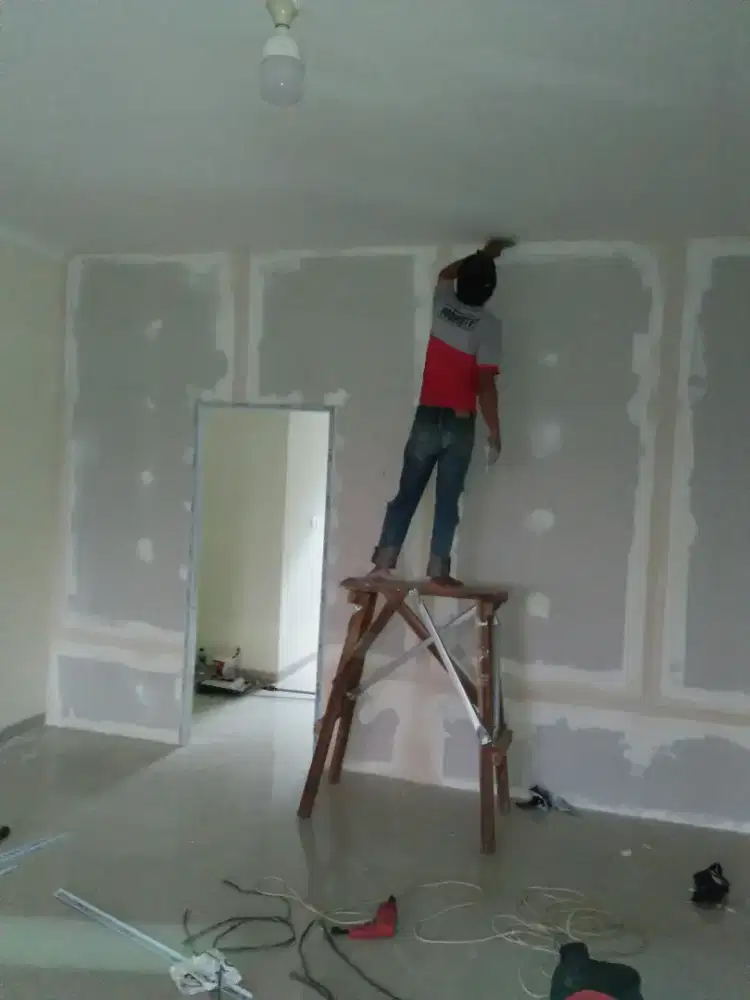 Partisi gypsum dan pengecatan