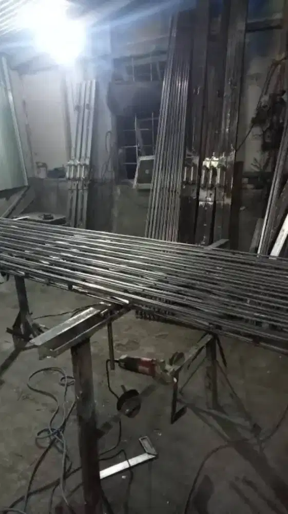 Jasa service pintu folding gate dan rolling door