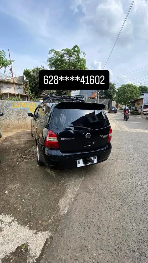 Nissan Grand Livina XV Ultimate 1.5CC AT Warna hitam